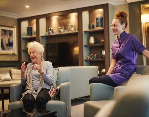 Old lady and a nurse.